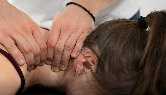 close-up-hands-massaging-neck