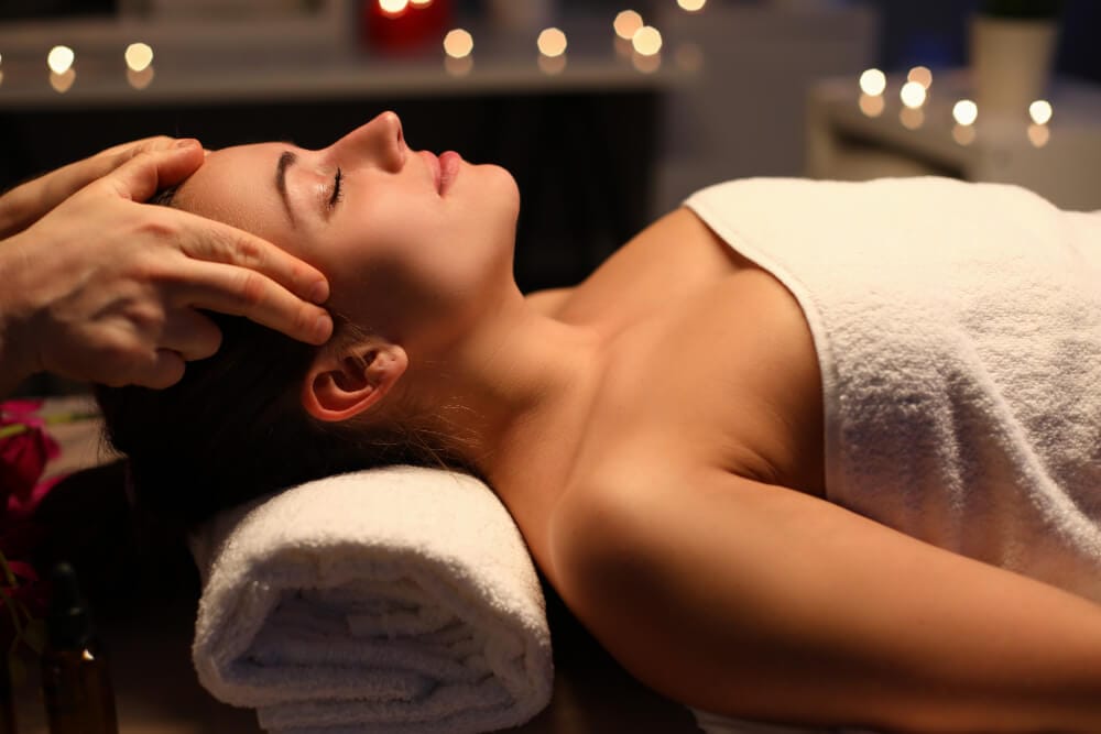 Girl doing relaxation head massage