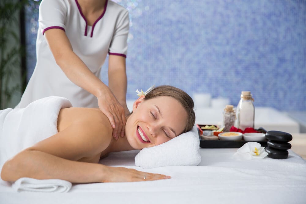 Woman-receiving a massage on the back