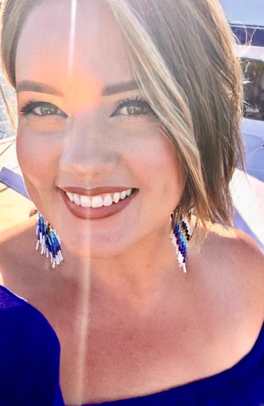 Amanda Deming smiling, owner of Inside Out Mobile Spa